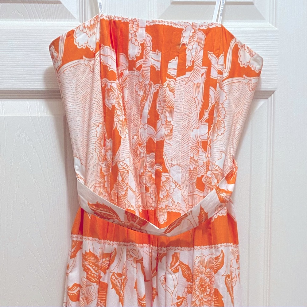 Laundry by design. Beautiful Orange and white.